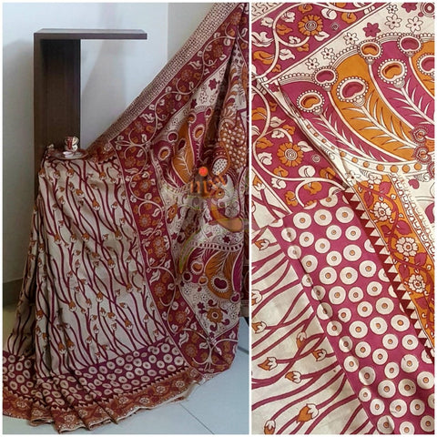 Off white handloom chennur silk kalamkari Saree with floral motifs on body, border and peacock motif on pallu. Saree comes with kalamkari printed blouse piece.