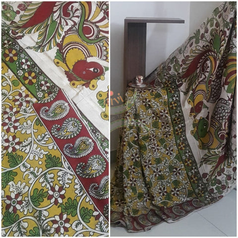 Yellow handloom chennur silk kalamkari saree with contrasting blouse piece.