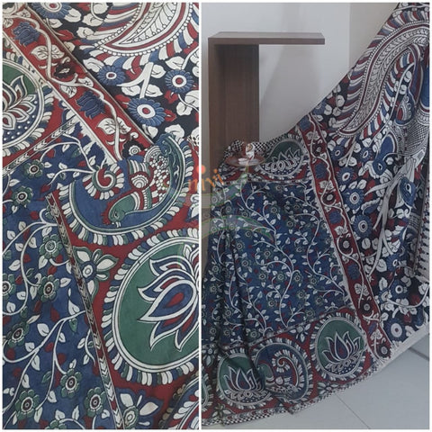Blue handloom chennur silk kalamkari Saree with floral motifs on body peacock and floral motif on the border and peacock motif on pallu. Saree comes with kalamkari printed blouse piece.