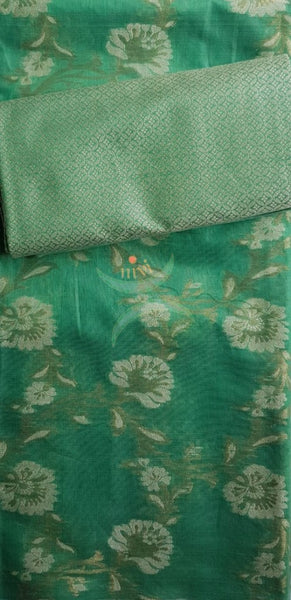 Sea green cotton benaras brocade traditionally woven three piece suit.