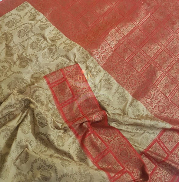 Beige pure muga silk benaras brocade with contrasting border and pallu