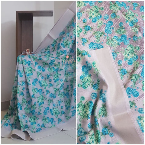 Digital printed linen blended Saree with contrasting blouse.