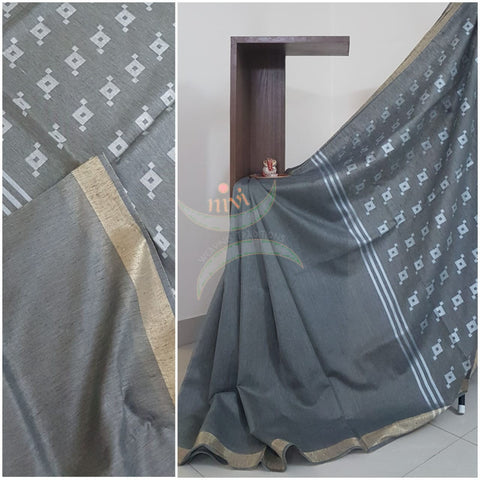 Grey Handloom linen  with subtle zari border.Saree comes with running blouse.