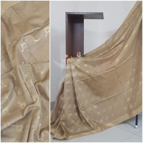 Beige Handloom linen with subtle zari border.Saree comes with running blouse.