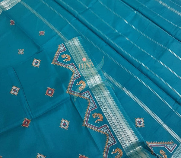 Teal blue kota cotton with traditional peacock motif kasuti embroidery