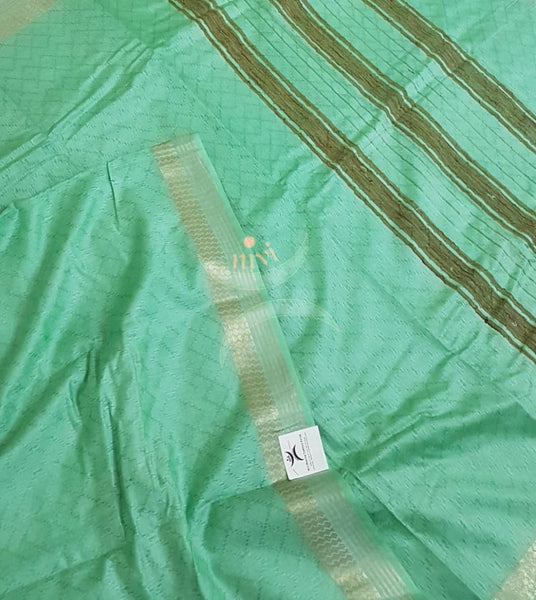 Mint green Bengal handloom cotton blend with jacquard pattern on body and geecha pallu.