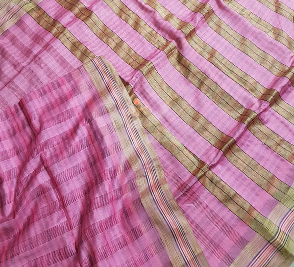 Pink bagalpuri tussar with self woven chequared pattern.