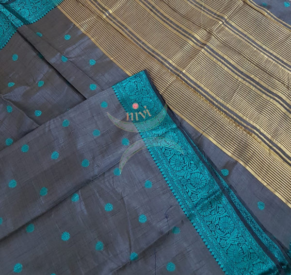 Grey with teal Art silk tussar with contrasting woven thread border and zari woven pallu