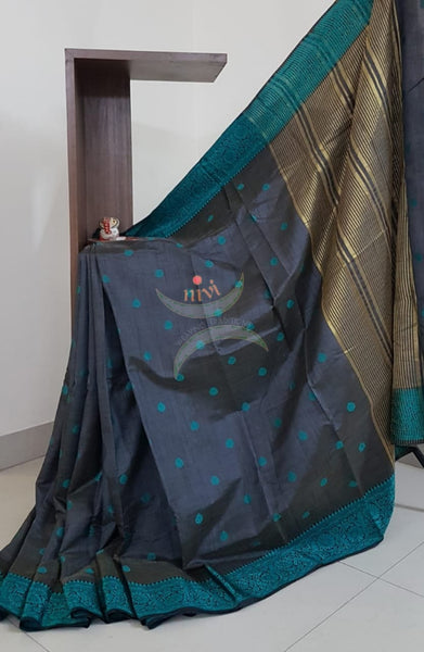 Grey with teal Art silk tussar with contrasting woven thread border and zari woven pallu