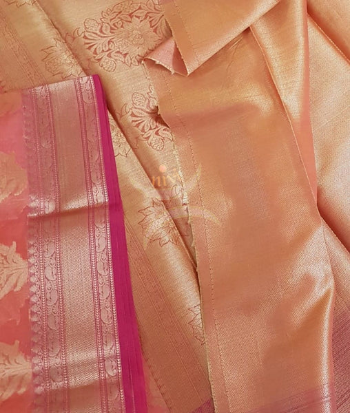 Peachish pink silk cotton benaras brocade with antique zari.