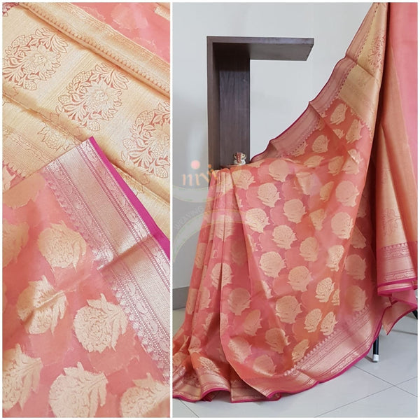 Peachish pink silk cotton benaras brocade with antique zari.