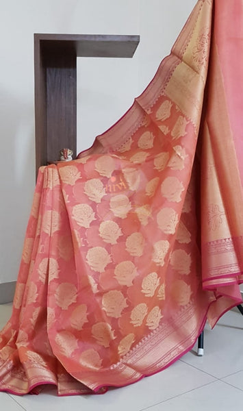 Peachish pink silk cotton benaras brocade with antique zari.