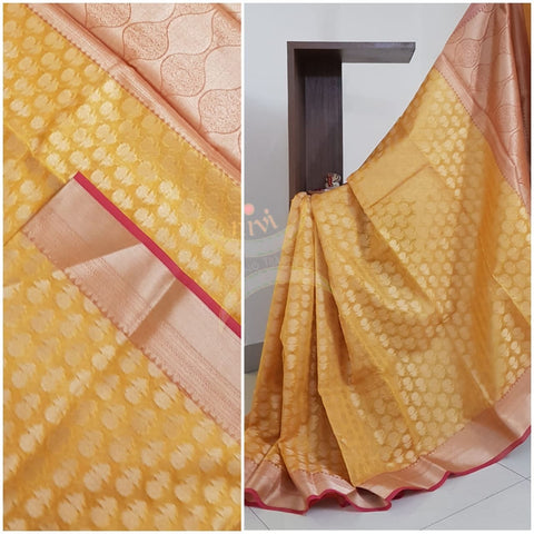 Yellow silk cotton benaras brocade with antique zari .