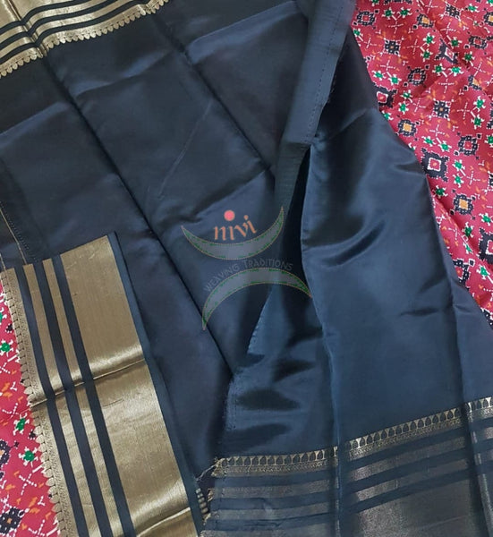 Printed patola silk saree with contrast black blouse and border