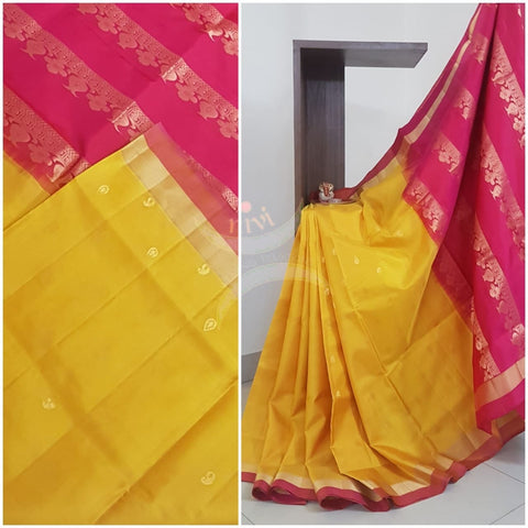 Yellow with pink handloom Uppada silk saree with all over booties.