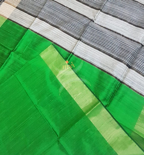 Green 100% pure handloom Bagalpuri silk with geecha pallu .