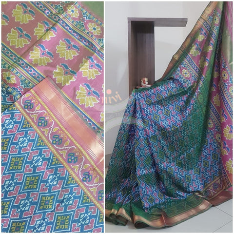 Blue Patola art silk printed saree with contrast blouse piece and tissue border