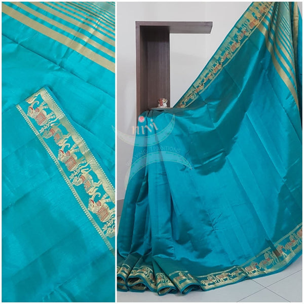 Blue Art silk tussar with traditional border and zari woven pallu