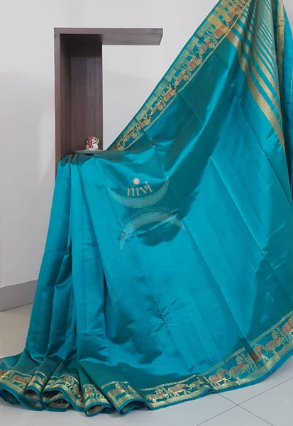 Blue Art silk tussar with traditional border and zari woven pallu