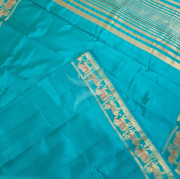 Blue Art silk tussar with traditional border and zari woven pallu