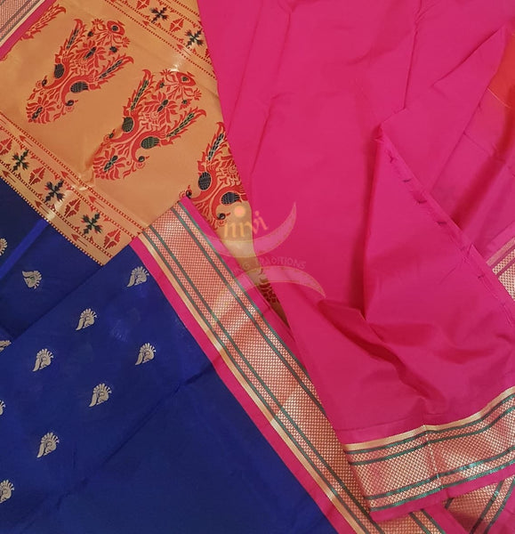 Royal blue silk paithani with contrasting pallu and blouse.