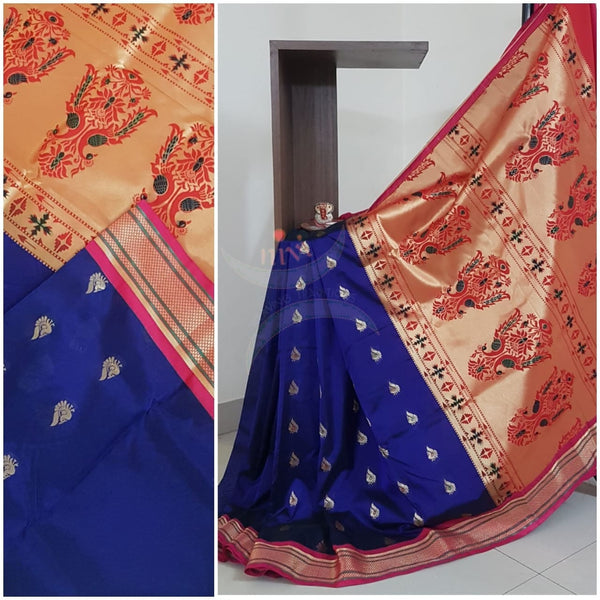 Royal blue silk paithani with contrasting pallu and blouse.