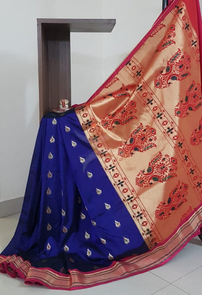 Royal blue silk paithani with contrasting pallu and blouse.