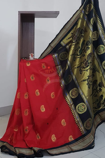 Red silk paithani with contrasting pallu and blouse.