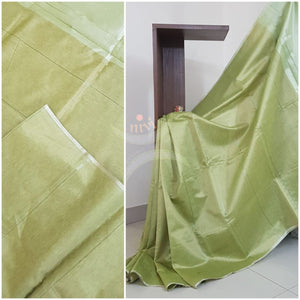 Green Tissue Bengal saree with brocade blouse.