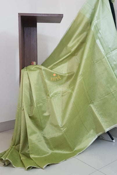 Green Tissue Bengal saree with brocade blouse.