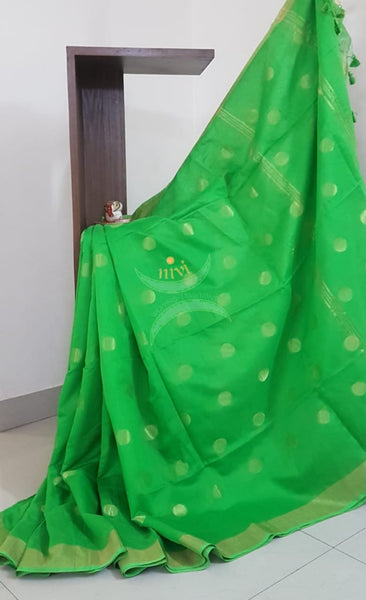 Green Bengal handloom woven saree with tissue border and allover woven booties.