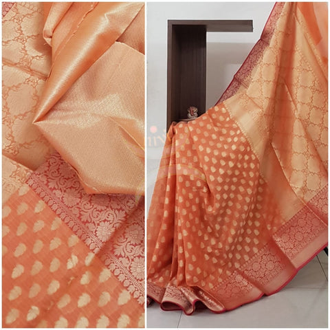 Orange silk cotton benaras brocade with antique zari  butties on body, pallu and border.