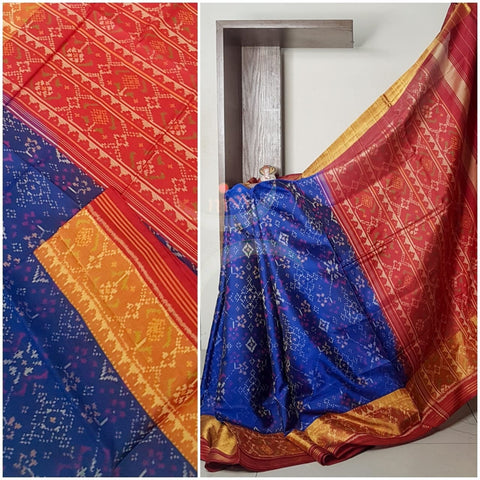 Royal blue Handloom patan patola silk saree with intricate woven pattern and subtle gold zari.