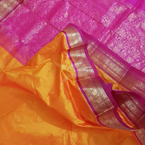 Mustard with pink handloom small Ghatti border pure south silk saree.