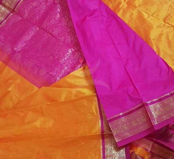 Mustard with pink handloom small Ghatti border pure south silk saree.