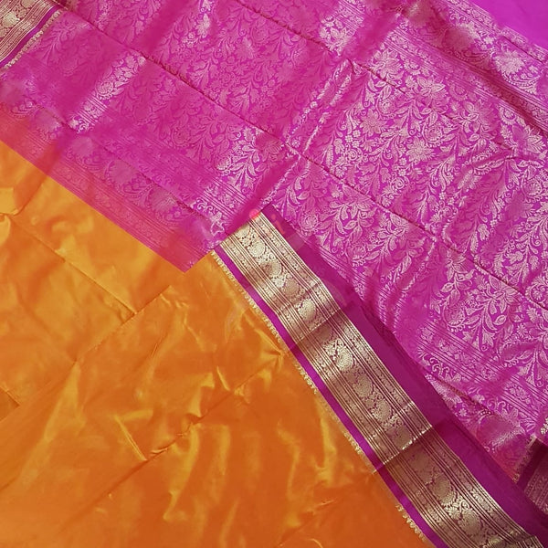 Mustard with pink handloom small Ghatti border pure south silk saree.