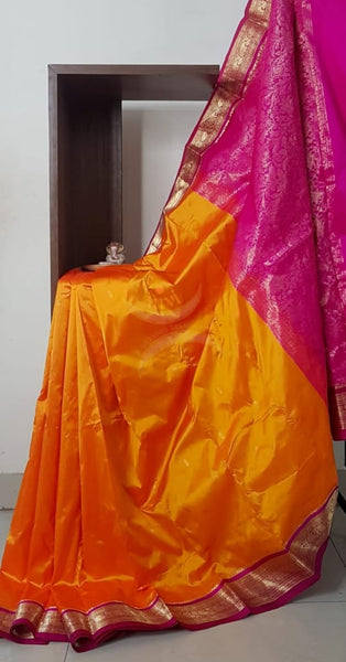 Mustard with pink handloom small Ghatti border pure south silk saree.