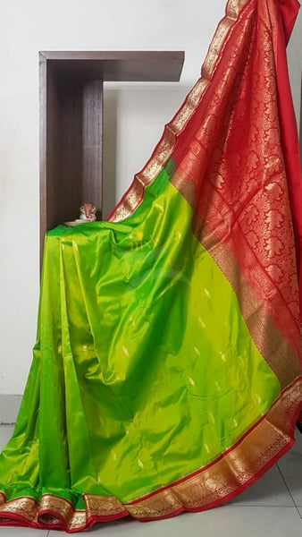 Green with maroon red handloom small Ghatti border pure south silk Saree.
