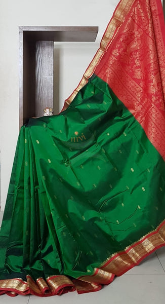 Green with maroon red handloom small Ghatti border pure south silk saree.