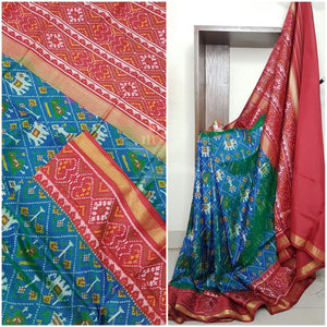 Teal blue Handloom patan patola silk saree with intricate woven pattern and subtle gold zari.