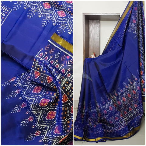 Royal blue Handloom patan patola silk saree with intricate woven pattern and subtle gold zari.
