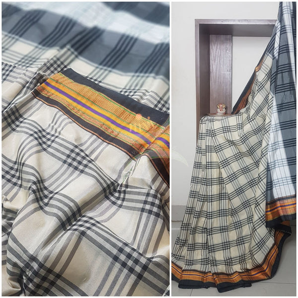 Gamcha checks cotton blended saree with traditional ilkal border.