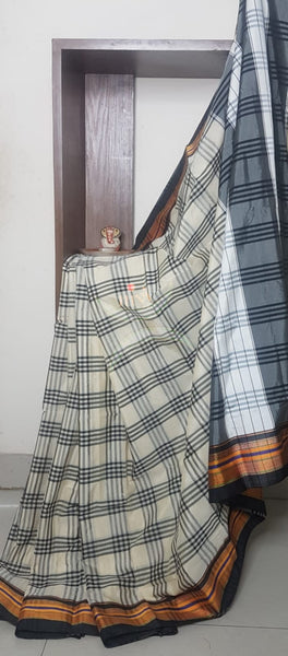 Gamcha checks cotton blended saree with traditional ilkal border.