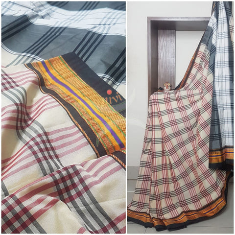 Gamcha checks cotton blended saree with traditional ilkal border.
