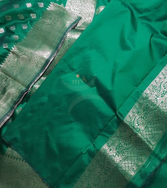 Dupion silk with resham benaras brocade saree.