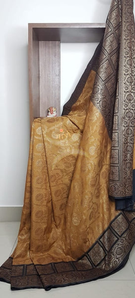 Mustard  brown muga silk benaras brocade with contrasting border and pallu