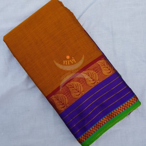 Rust orange with purple combination mercerised south cotton saree.