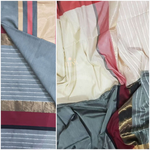 Grey and cream half and half merserised cotton with woven zari border and pallu.