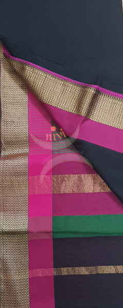 Black merserised cotton with woven zari border and pallu.