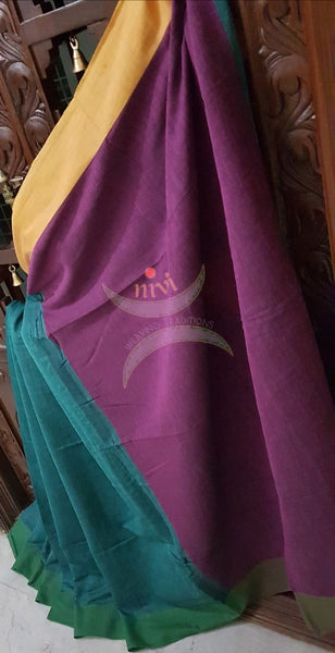 Teal Handloom linen saree with contrast border and pallu.